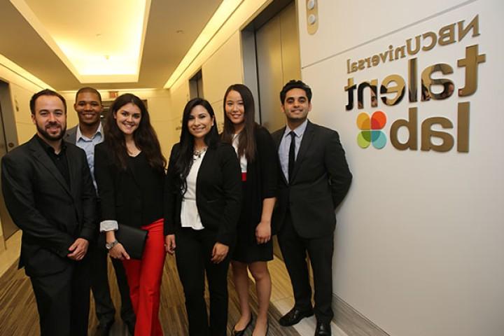 Students in suits near wall in NBC Universal talent lab